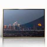 Large art print of Los Angeles skyline in gold tones on acrylic, framed, in mid-century modernist style.