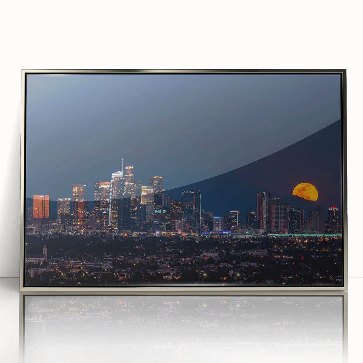 Mid-century modernist art depicting the Los Angeles skyline in muted gray tones, framed in silver acrylic.