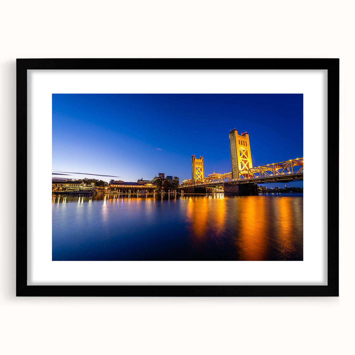 Extra large abstract art print of Sacramento scenery in vibrant colors on a textured canvas, framed in black.