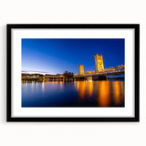Extra large abstract art print of Sacramento scenery in vibrant colors on a textured canvas, framed in black.