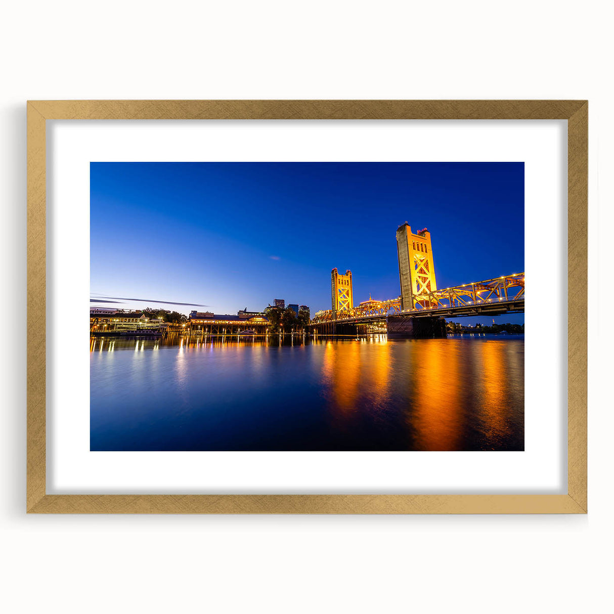 Extra large abstract art print of Sacramento scenery in gold frame with mat, using a textured style and muted earth tones.