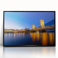 Large abstract wall art of Sacramento's skyline in muted grays and blues, framed in black acrylic.