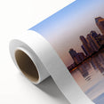 Art deco poster of San Diego skyline in pastel shades on rolled canvas, suitable as nursery wall art.