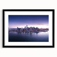 Colorful abstract art print of San Francisco skyline, featuring vibrant hues on a large framed canvas.