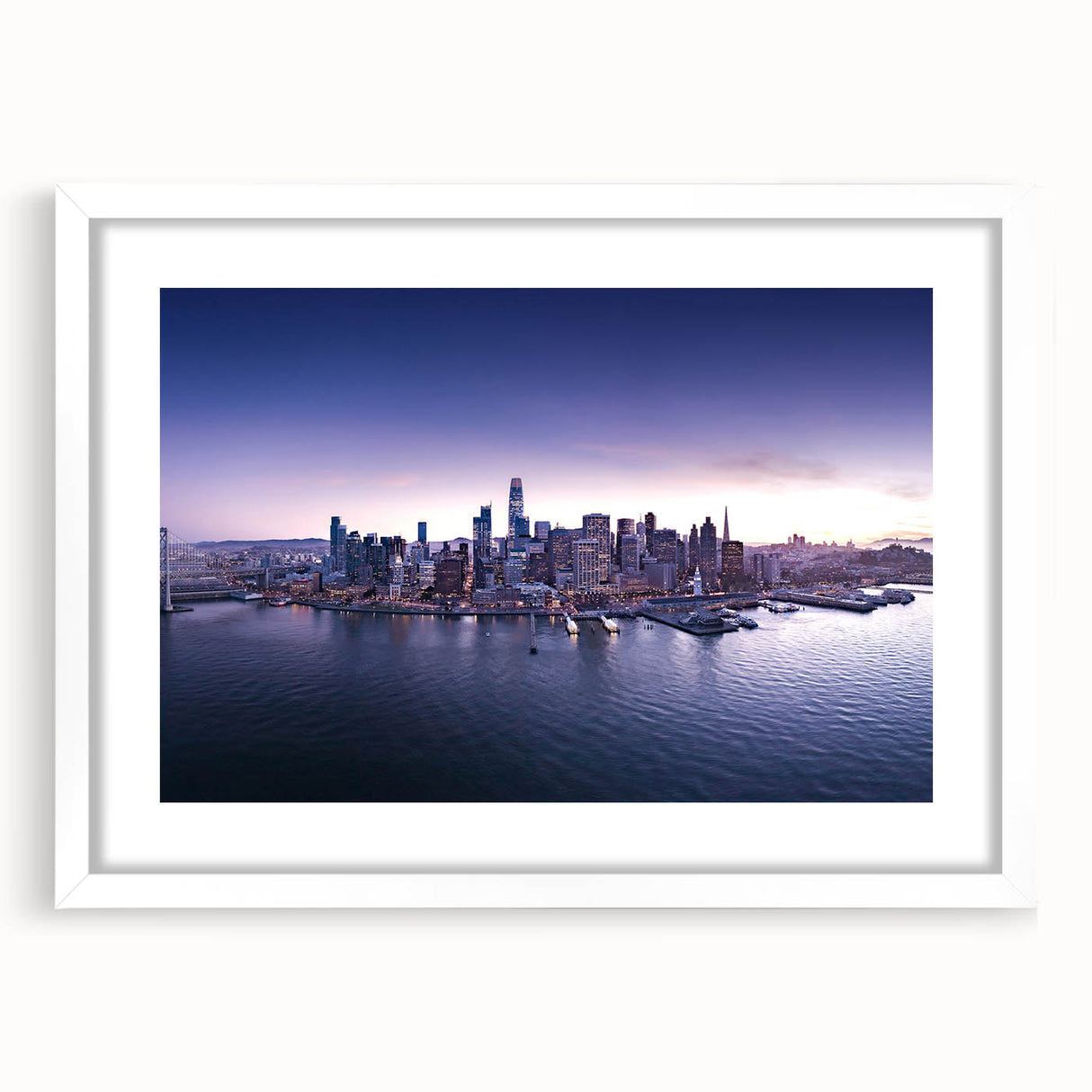 Abstract art print of San Francisco skyline in muted blue and gray tones on a framed white mat, ideal for dining room decor.