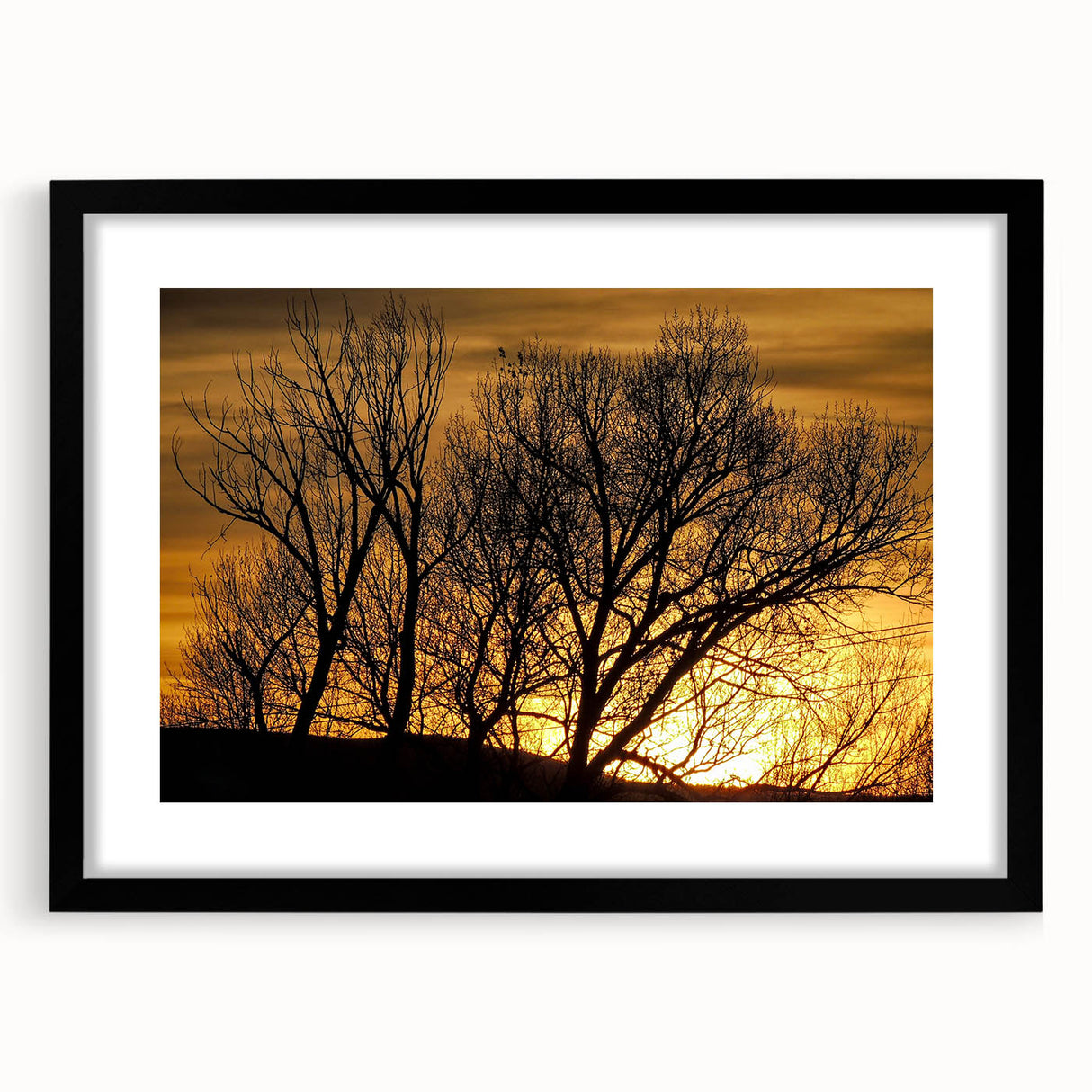 Abstract art print of Vail, Colorado in vibrant colors on a textured canvas, framed in black, ideal for living room decor.