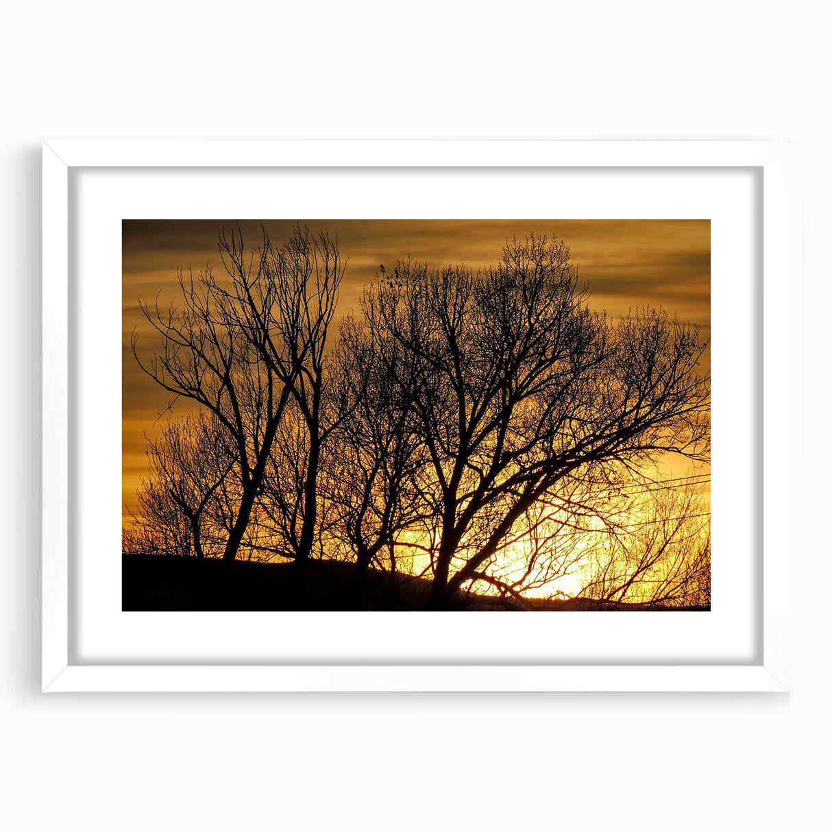 Abstract art print depicting a serene Vail, Colorado landscape in muted earth tones, framed with a white mat.