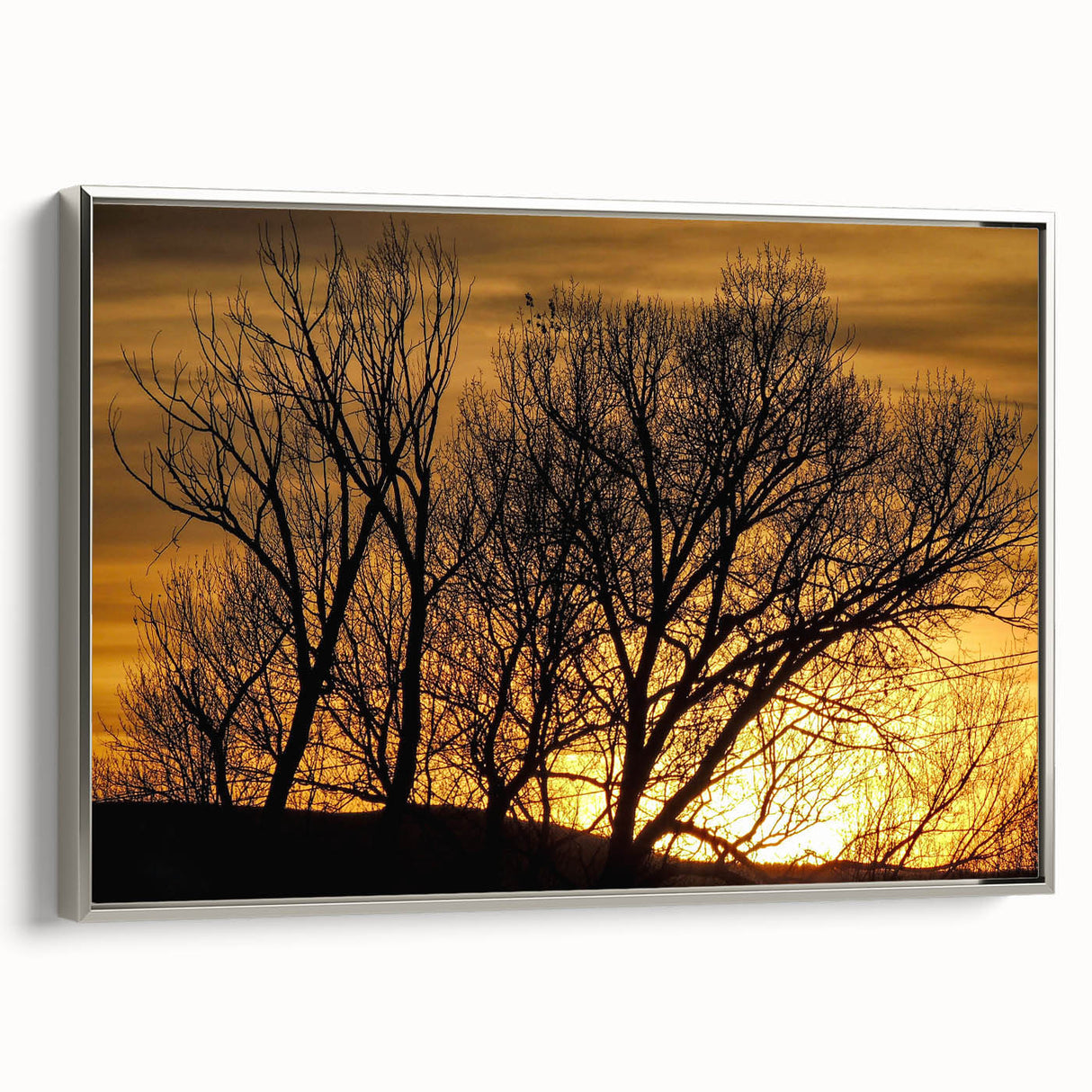 Landscape art painting of Vail, Colorado, featuring colorful autumn trees on a black background, framed in silver.