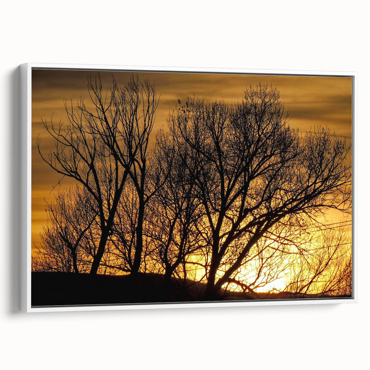 Vintage poster art of Vail, Colorado scenery on a framed canvas, featuring colorful art with black borders.