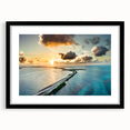 Colorful abstract art print of the Florida Keys in vibrant hues on a large textured canvas, framed in black.