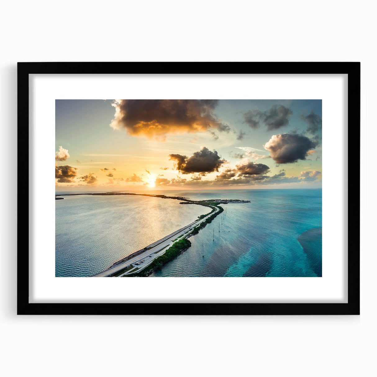 Colorful abstract art print of the Florida Keys in vibrant hues on a large textured canvas, framed in black.