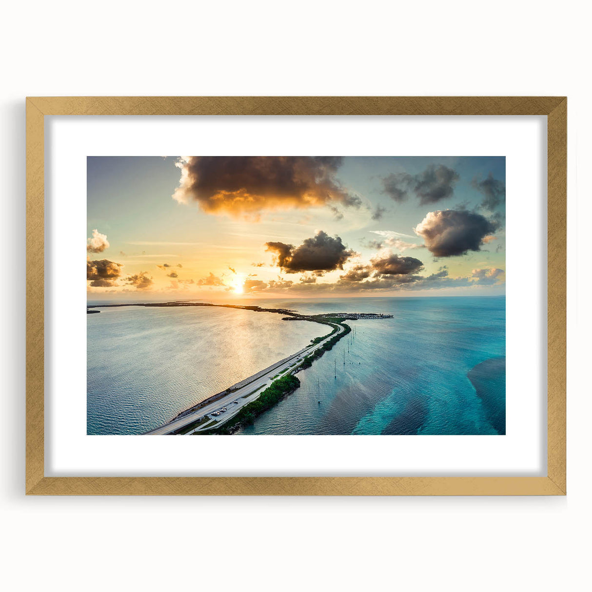 Extra large wall art depicting an abstract interpretation of the Florida Keys in textured blues and greens, framed in gold.