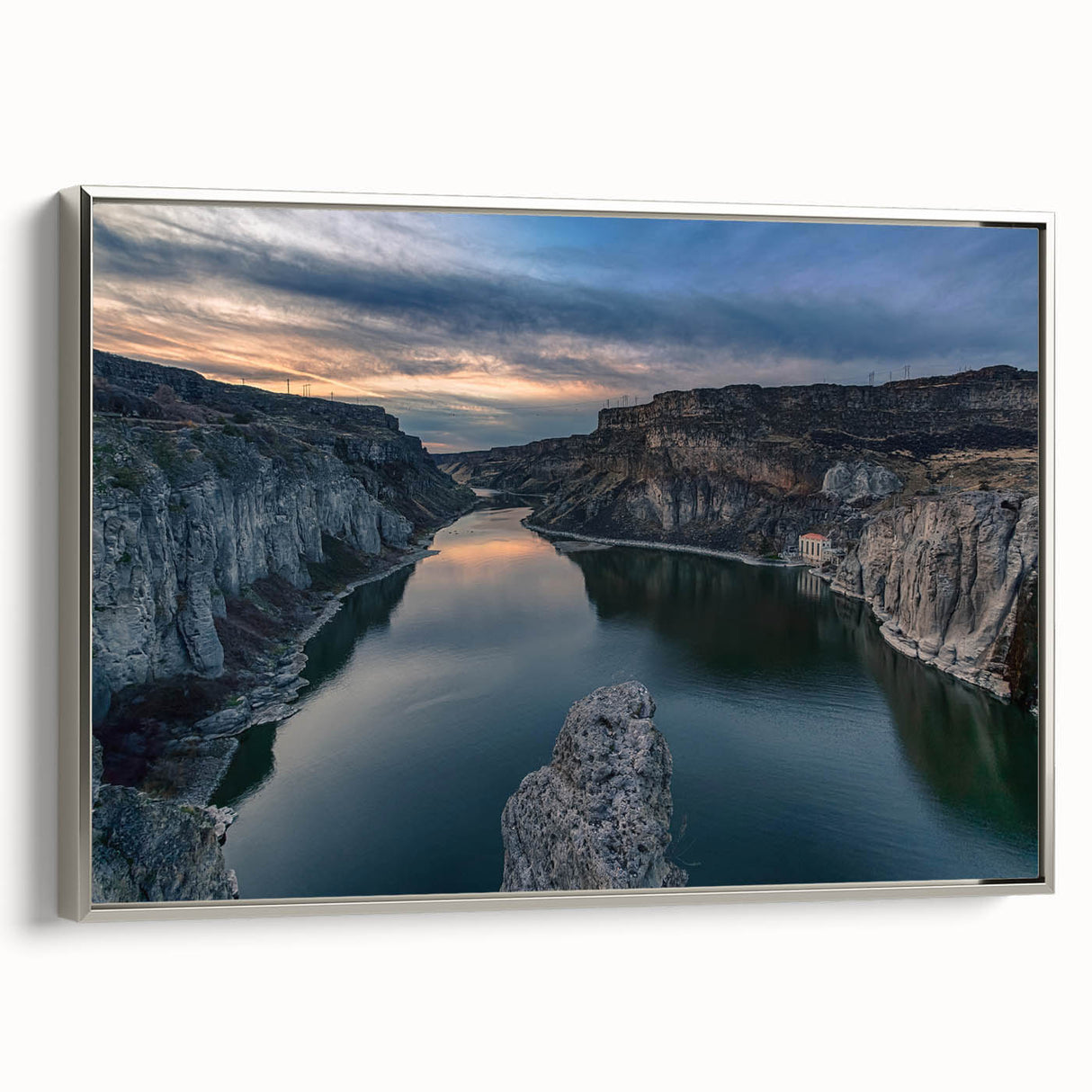 Framed canvas depicting a vintage-style Idaho landscape with colorful art elements and a black border.