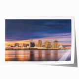 Rolled print of New Orleans scenery with floral elements in muted earth tones, ideal for dining room wall art.