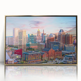 Framed acrylic print of Baltimore skyline in gold and blue tones, ideal for modern art wall decor.