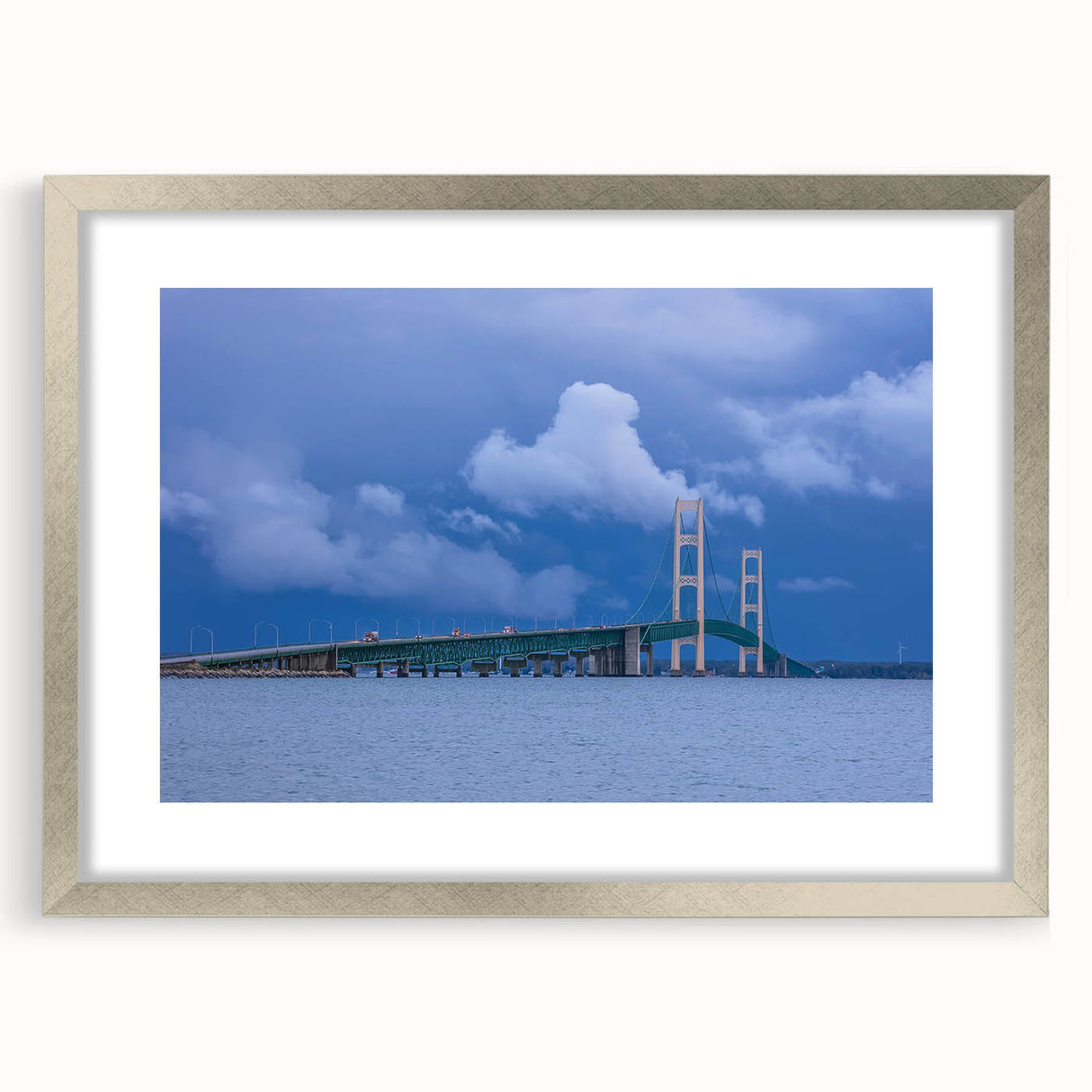 Textured abstract art print of Michigan's Upper Peninsula in muted earth tones on a framed silver mat.