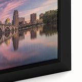 Extra large framed canvas of Minneapolis skyline in black with colorful, textured highlights, ideal for living room decor.