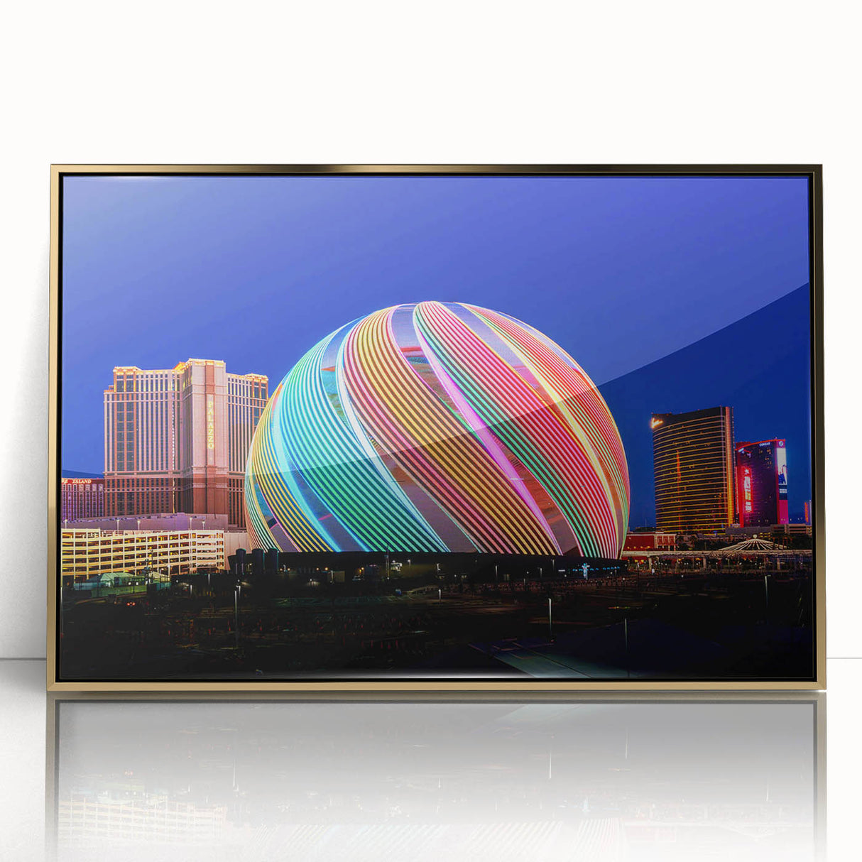 Mid-century modernist Las Vegas skyline on a gold-framed acrylic print, with vibrant twilight hues.
