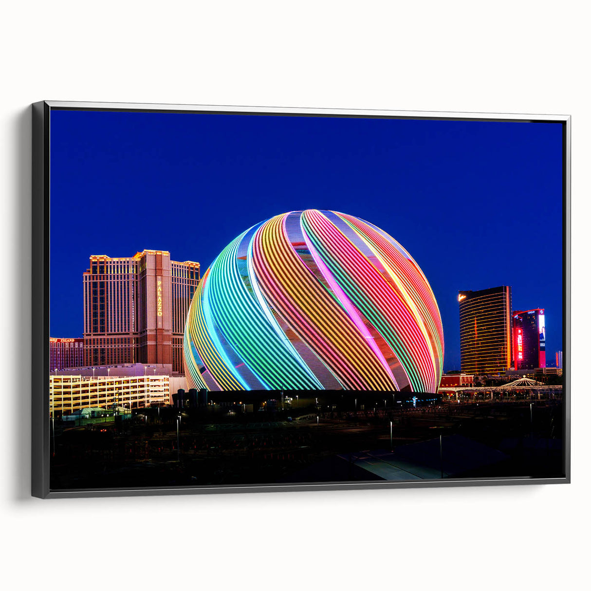 Black and white wall art featuring a vintage poster art style landscape of Las Vegas on framed canvas.