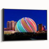 Black and white wall art featuring a vintage poster art style landscape of Las Vegas on framed canvas.