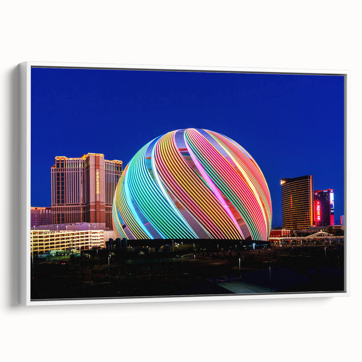Framed canvas of vintage poster art depicting colorful Las Vegas scenery, ideal for living room decor.