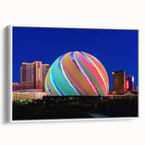 Framed canvas of vintage poster art depicting colorful Las Vegas scenery, ideal for living room decor.