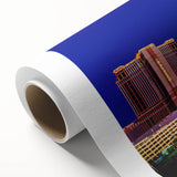 Art deco poster of Las Vegas skyline in monochrome shades on rolled canvas.