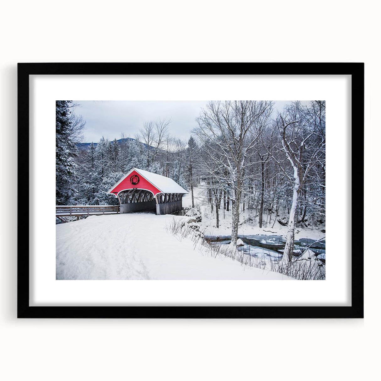 Abstract art print of a colorful, textured landscape, in extra large format, framed in black, ideal for living room decor.