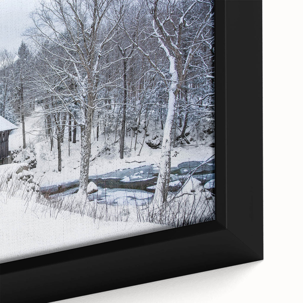 Close-up of a textured black wall art depicting New Hampshire scenery on a framed canvas, featuring a mix of vibrant colors.