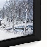 Close-up of a textured black wall art depicting New Hampshire scenery on a framed canvas, featuring a mix of vibrant colors.
