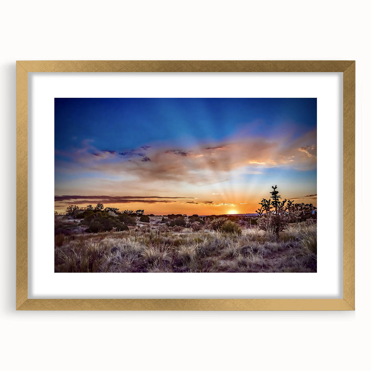 Extra large abstract art print depicting textured New Mexico scenery in earth tones, framed in gold.