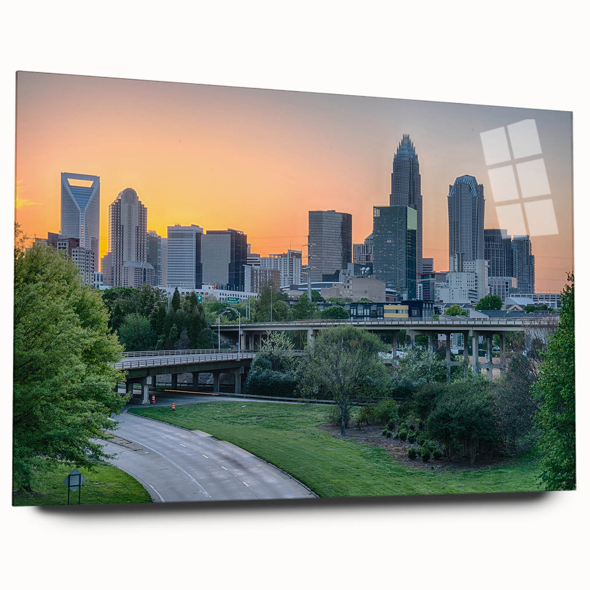 Acrylic print of Charlotte, North Carolina skyline in muted blues and grays, suitable for bedroom or dining room art.