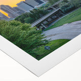 Art deco poster of Charlotte skyline in muted metallic tones on rolled canvas, suitable for dining room wall art.