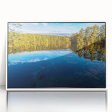 Art deco poster of Raleigh skyline in muted gray and blue tones on framed acrylic, ideal for modern nursery wall decor.