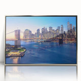 Mid-century modernist art depicting the Manhattan skyline in muted silver tones on a framed acrylic.
