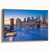 Framed canvas wall art depicting a vintage-style Manhattan skyline in black and gold tones, ideal for bedroom decor.