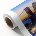 Art deco poster of Manhattan skyline in muted gray and blue tones, rolled canvas ideal for nursery wall art.