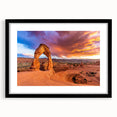 Extra large abstract print of Arches National Park in vibrant, colorful hues on a black framed canvas.