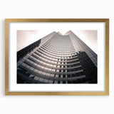 Extra large abstract art print of Seattle skyline in textured hues of blue and gray on a framed canvas.