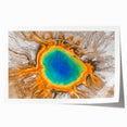 Yellowstone National Park scenery on rolled canvas, featuring lush greenery and geothermal features, in natural earth tones.