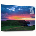 Acrylic landscape artwork featuring dramatic cliffs and vibrant colors, displayed in a sleek glass frame with visible mounting pins, perfect for modern home decor.