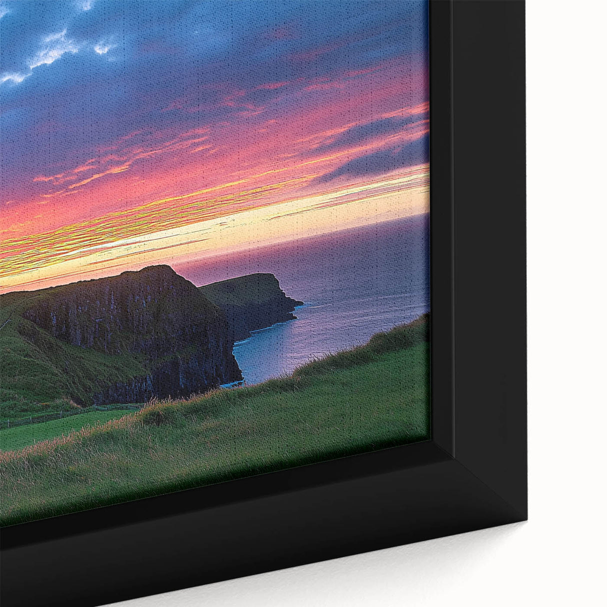 Close-up view of a framed canvas artwork depicting vibrant cliffs and landscapes, showcasing intricate textures and colors, perfect for home decor enhancement.