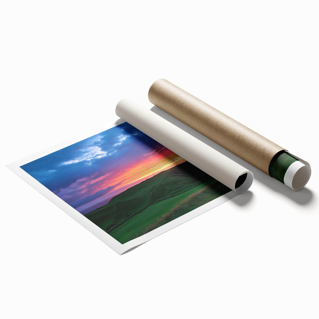 Stunning rolled print showcasing a dramatic landscape of cliffs under a vibrant sunset, perfect for home decor. Packaged securely in a protective cardboard tube for safe shipping.