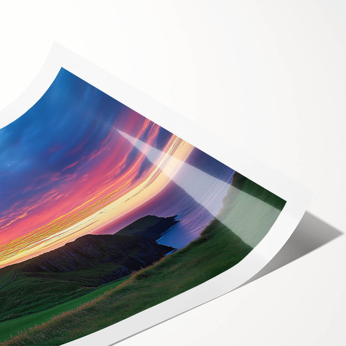 Stunning landscape print showcasing dramatic cliffs and vibrant colors, rolled for easy transport and display in a protective cardboard tube. Ideal for enhancing home decor.