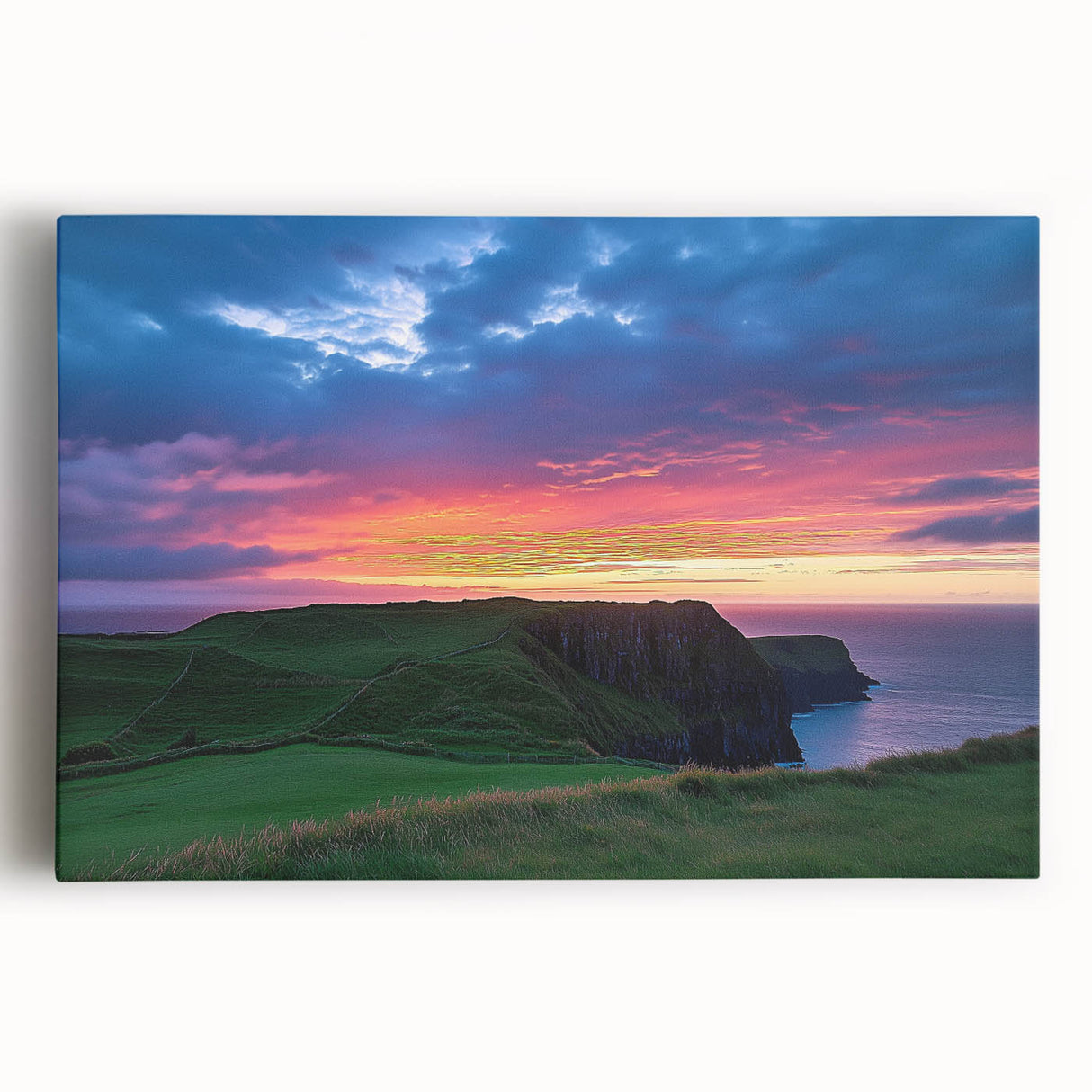 Stretched canvas art showcasing a breathtaking cliff landscape at sunset, featuring vibrant orange and purple hues, perfect for enhancing modern decor.