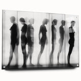 Abstract figurative artwork displayed in a glass frame, showcasing vibrant colors and dynamic shapes, perfect for modern home decor and artistic settings.
