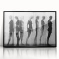 Framed acrylic artwork showcasing an abstract figurative design in black, set against a sleek modern backdrop, ideal for contemporary home decor.