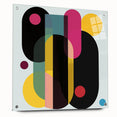 Abstract geometric acrylic glass art piece showcasing vibrant colors and intricate patterns, presented in a side view with decorative pins for display.