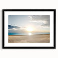 Framed landscape artwork depicting a serene beach scene with vibrant colors, featuring a black mat and sleek frame, ideal for home decor and coastal themes.