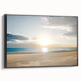 Framed canvas artwork showcasing a vibrant beach landscape with vivid blue skies and golden sands, featuring a sleek black frame for modern decor. Perfect for beach-themed interiors.